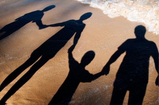 A family enjoying a safe day at the beach.